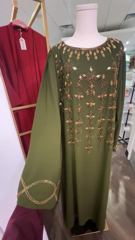Closed Dubai abaya with gold embellishment